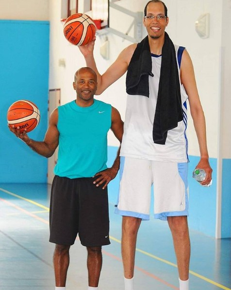 Brahim Takioullah holding a basketball